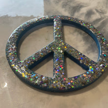 Medium gold glitter, sequin and resin peace sign.