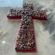 Medium size sequin glitter and resin cross hot pink.