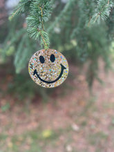 Gold super glitter smiley face Christmas decoration.