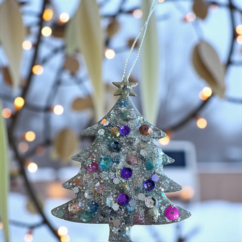Silver glitter and sequin tree Christmas tree decoration.