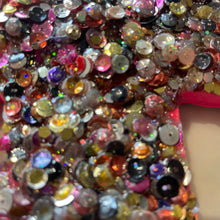Medium size sequin glitter and resin cross hot pink.