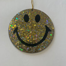 Gold super glitter smiley face Christmas decoration.