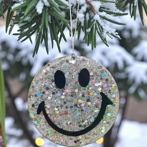 Silver super glitter smiley face tree decoration.