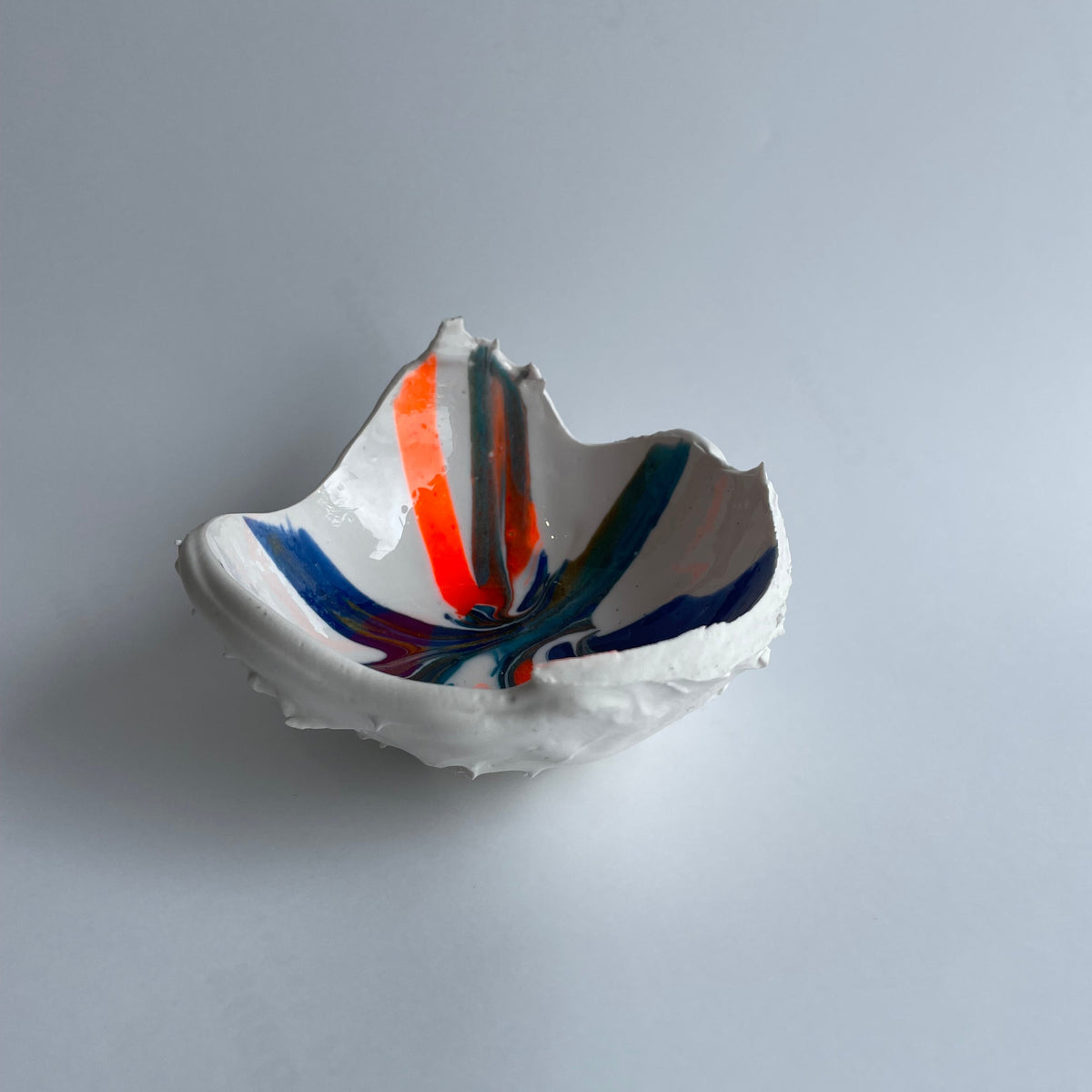 Horse chestnut inspired Hatched white blue orange hint of gold.