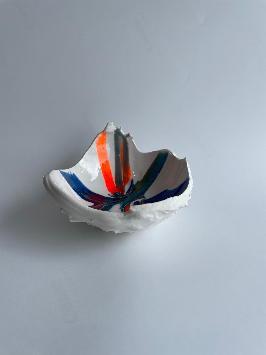 Horse chestnut inspired Hatched white blue orange hint of gold.