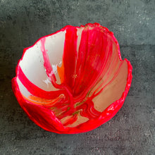 Large hatched in hot pink, white and orange