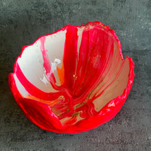 Large hatched in hot pink, white and orange