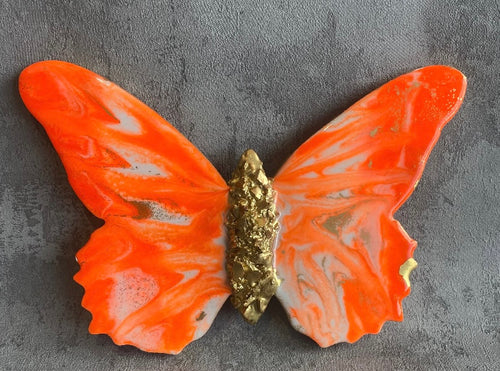 Medium orange quartz crystal and resin butterfly