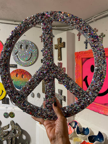 Large resin sequin and glitter peace sign.