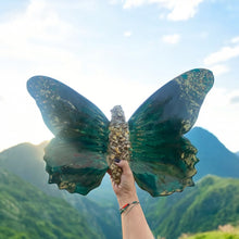 Large green and gold resin and quartz crystal butterfly.