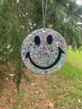 Silver super glitter smiley face tree decoration.