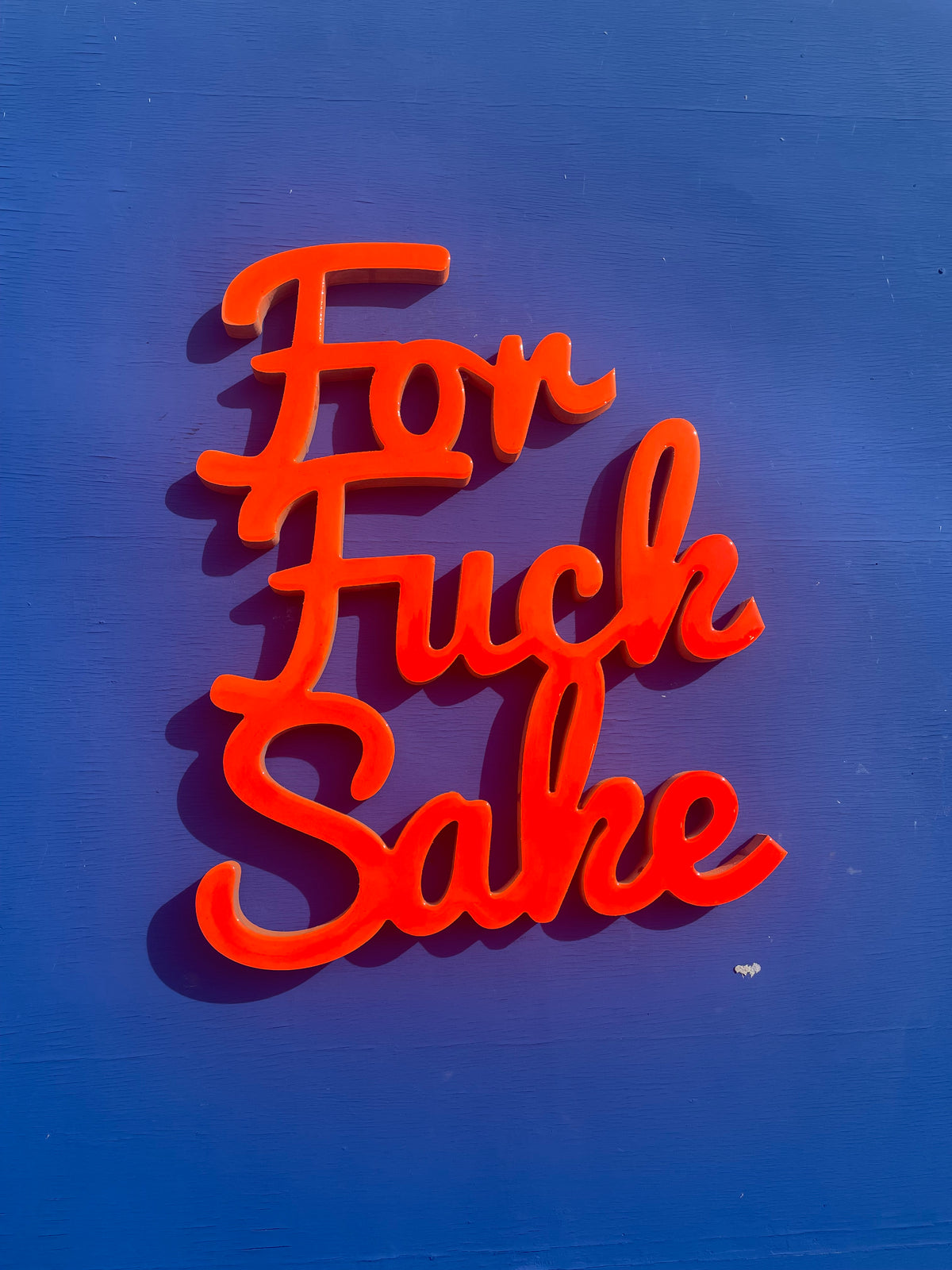 Large ffs statement sign. Neon orange.