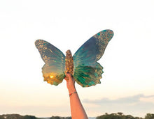 Large green and gold resin and quartz crystal butterfly.