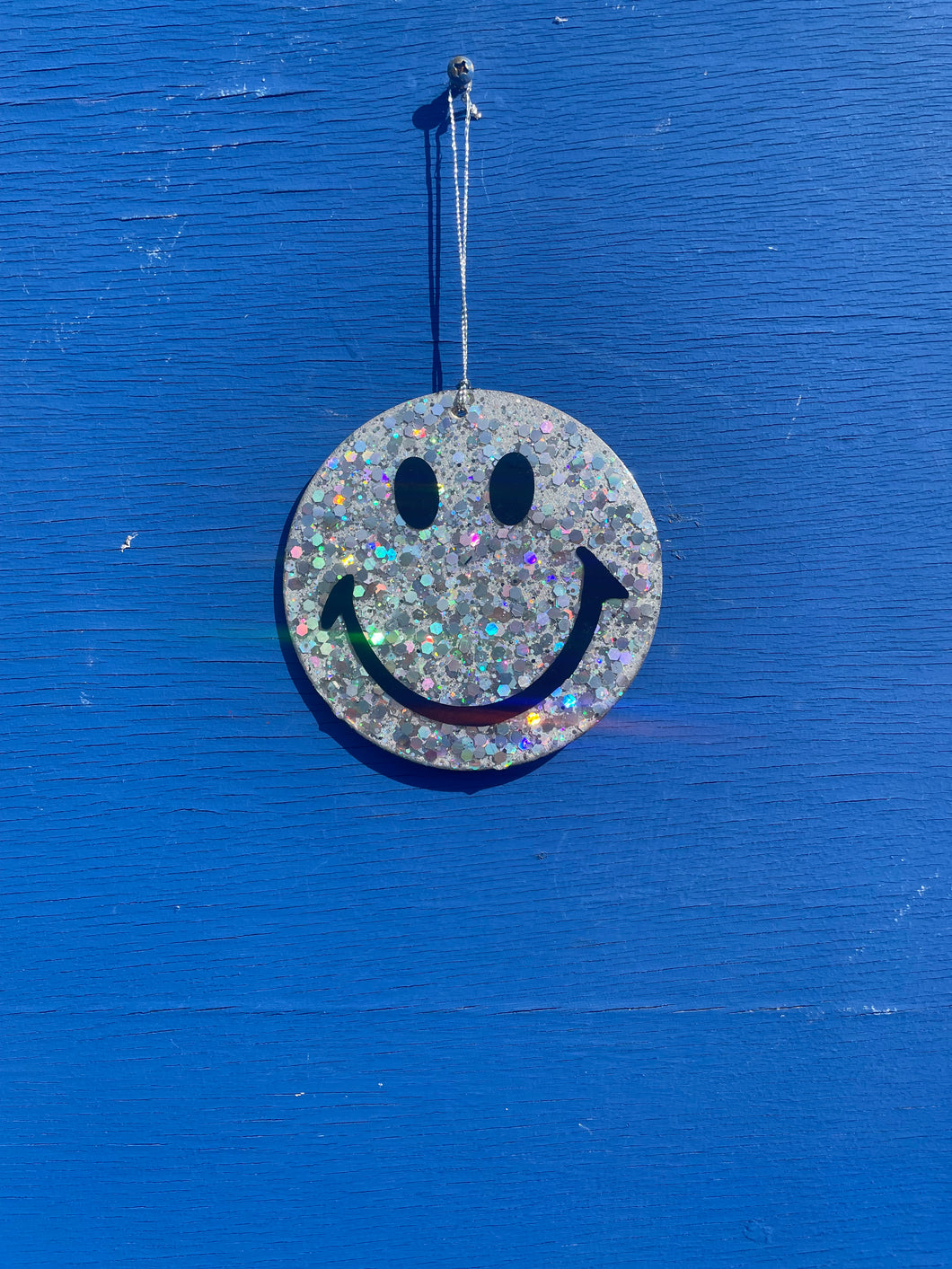 Silver glitter hanging smiley face