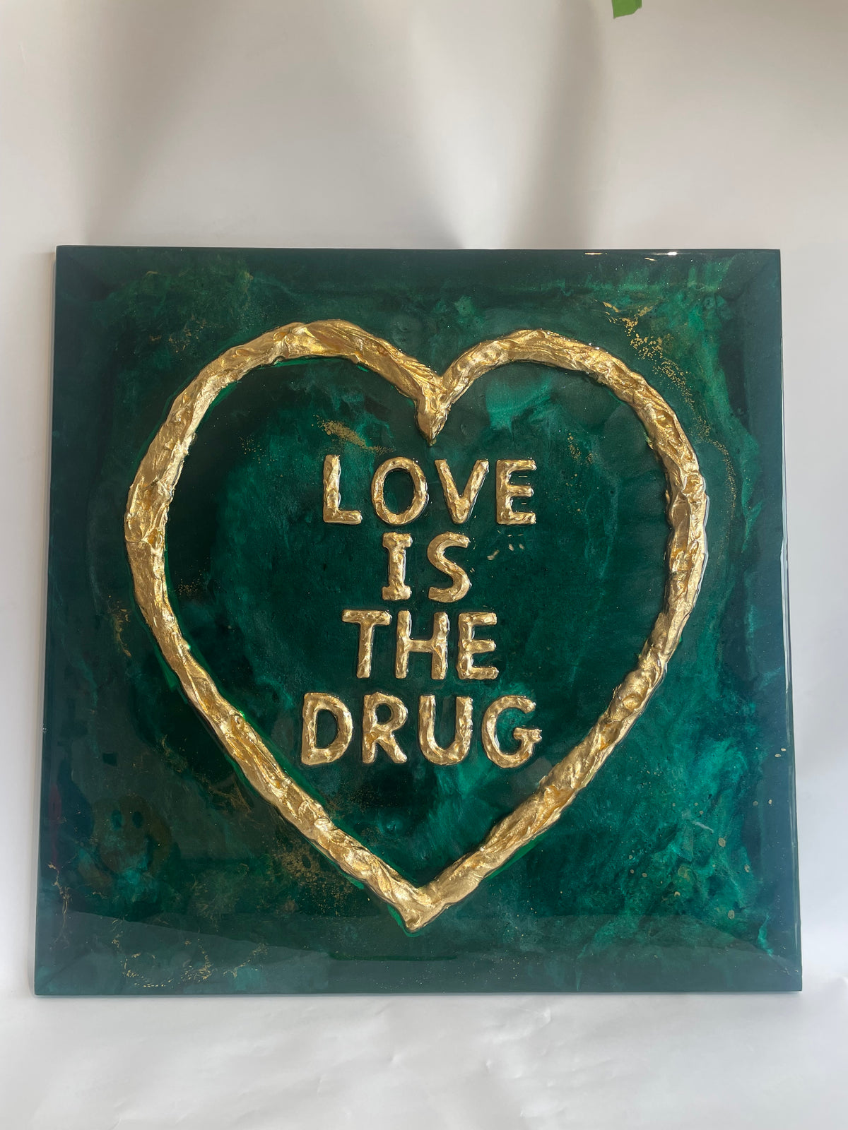 Emerald green and gold love is the drug resin art work. Made to order.