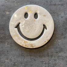 Small 20cm smiley face pearl and gold resin.