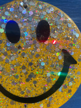 Yellow glitter hanging smiley face.