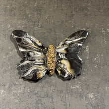 Medium quartz crystal and resin black and gold butterfly