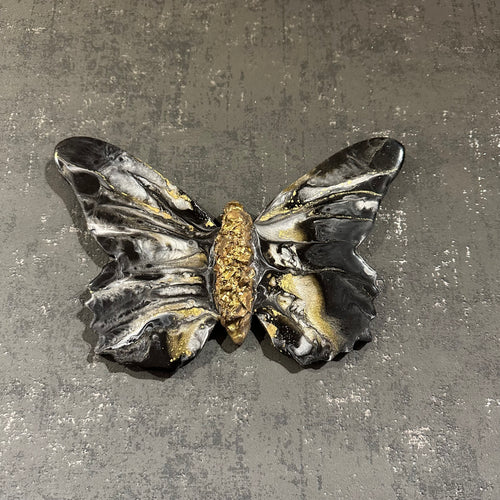 Medium quartz crystal and resin black and gold butterfly