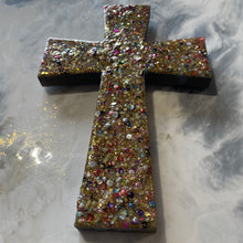 Medium gold sequin glitter and resin cross.