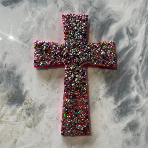 Medium size sequin glitter and resin cross hot pink.