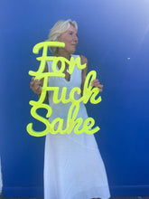 Large ffs statement sign in glow in the dark neon yellow.