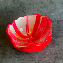 Large hatched in hot pink, white and orange