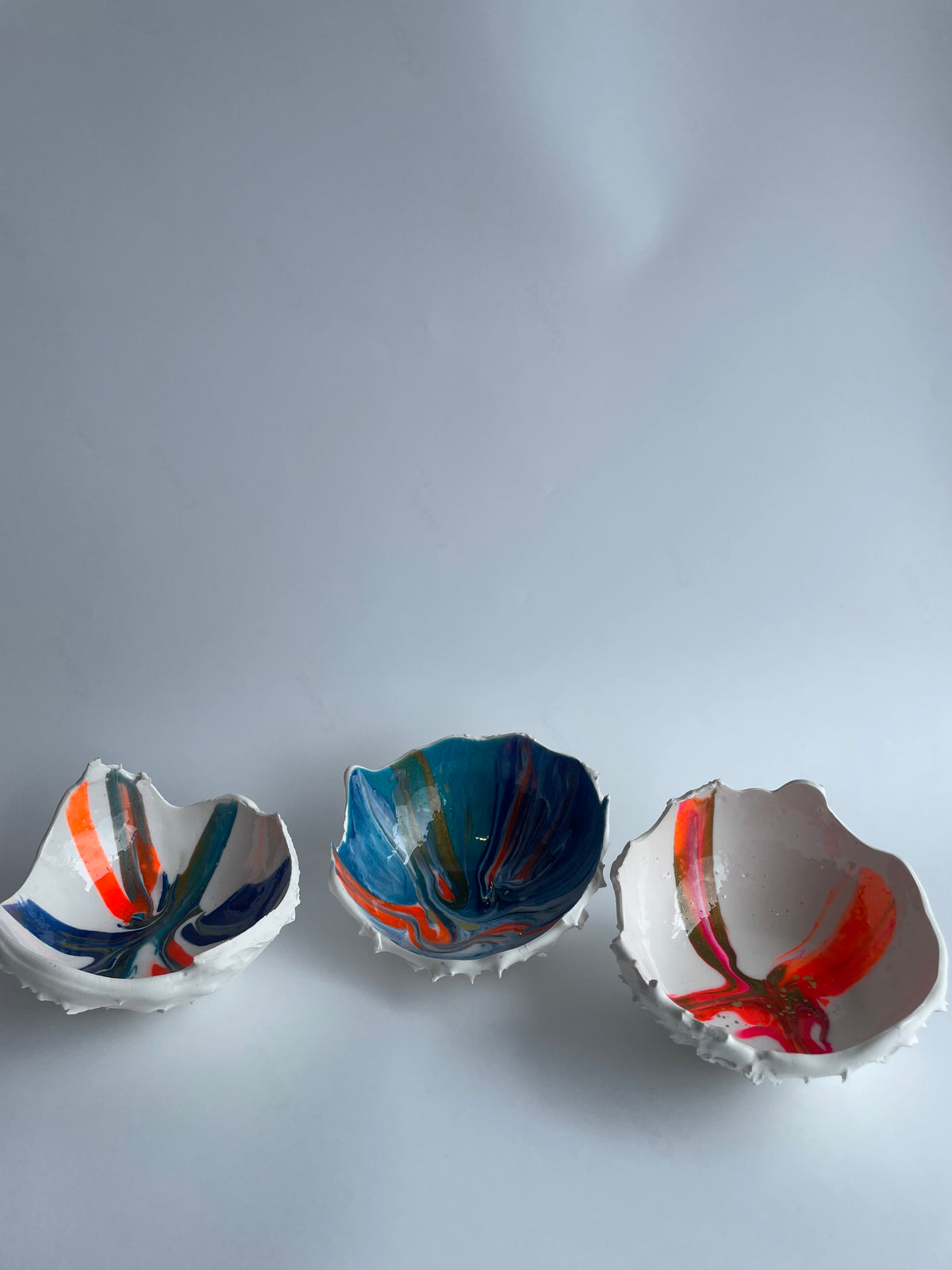 Horse chestnut inspired Hatched white blue orange hint of gold.