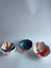 Horse chestnut inspired Hatched white blue orange hint of gold.