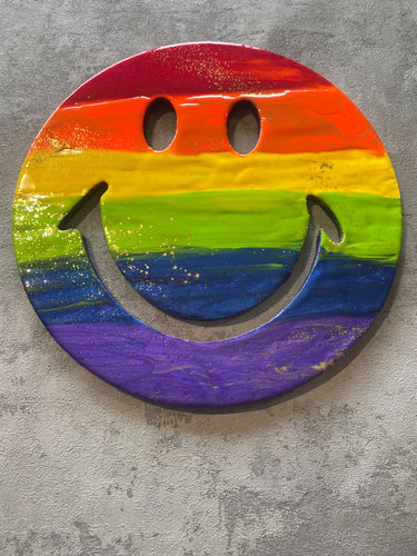 Smiley resin face in rainbow pattern 30cm