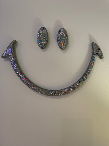 Large silver glitter eyes and mouth