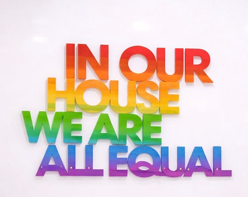 IN OUR HOUSE WE ARE ALL EQUAL. Statement sign. Resin